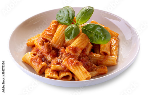 Macaroni rigatoni with tomato sauce and meat in white dish with basil leaves, isolated photo