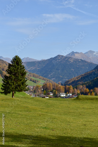 Amazing aerial view of the Dolomite Alps at sunny autumn day.