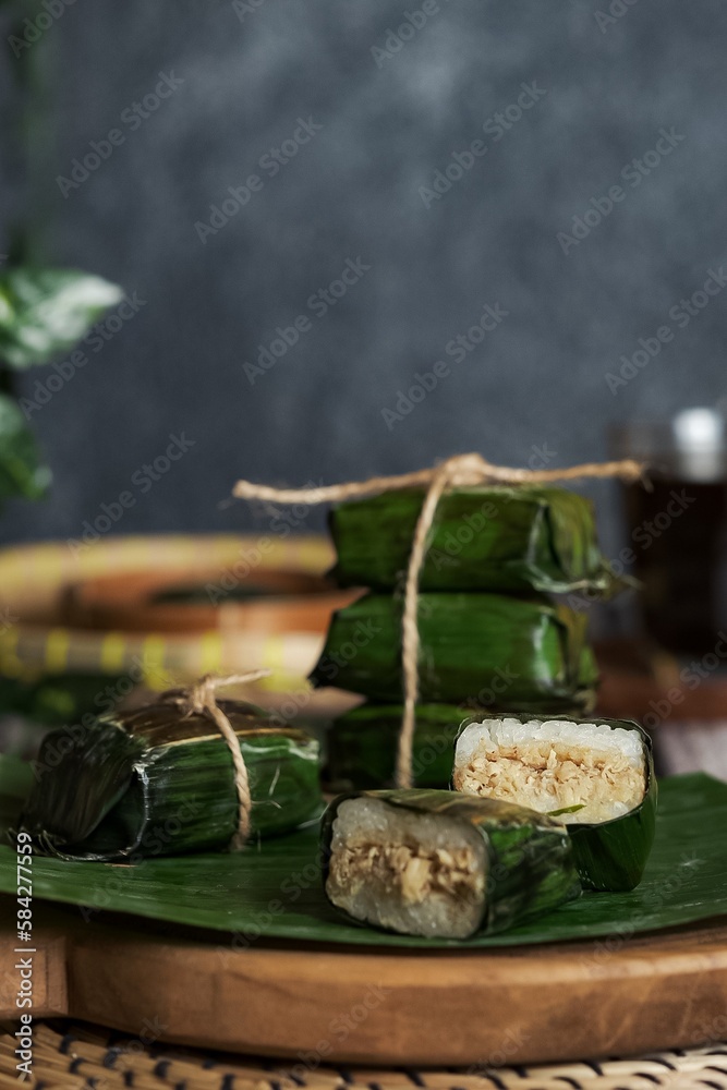 lemper ayam, chicken lemper is glutinous rice cake filled chicken