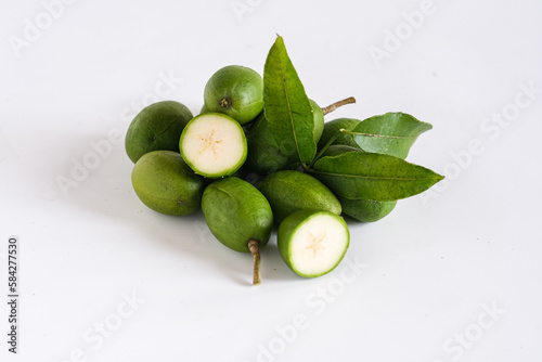 kedondong or ambarella is a tropical fruit. this fruit usually used in salad fruit or rujak and juice photo