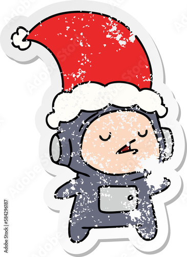 christmas distressed sticker cartoon of kawaii astronaut © lineartestpilot
