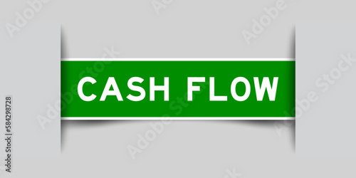 Green color square label sticker with word cash flow that inserted in gray background