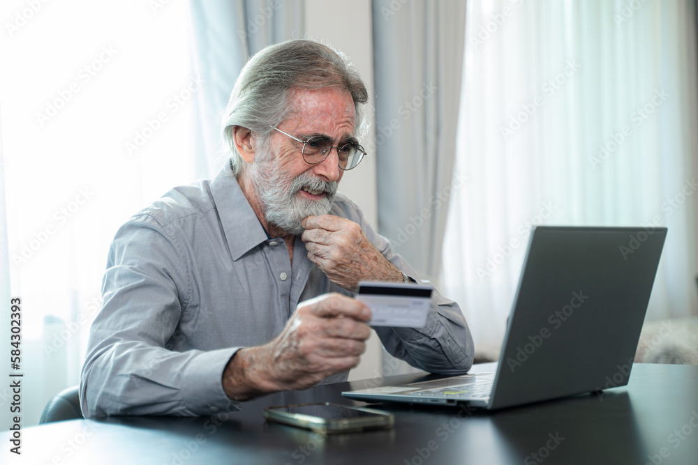 Retirement and Credit Cards,Smart senior male pay bills or shop on internet using smartphone,Elderly technology. Retirement and Credit Cards,Smart senior male pay bills or shop on internet using smartphone,Elderly technology.