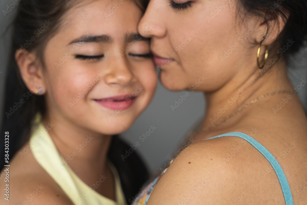 close up portrait of a mother and her super cute little girl close up portrait of a mother and her super cute little girl
