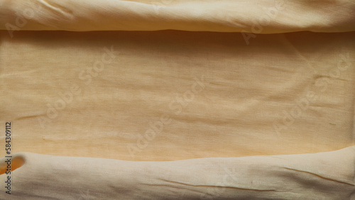 Abstract background and texture from yellow linen fabric, made from linen fibers and frame around