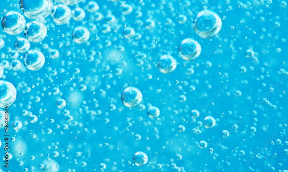 Turquoise background water texture close up with bubbles underwater