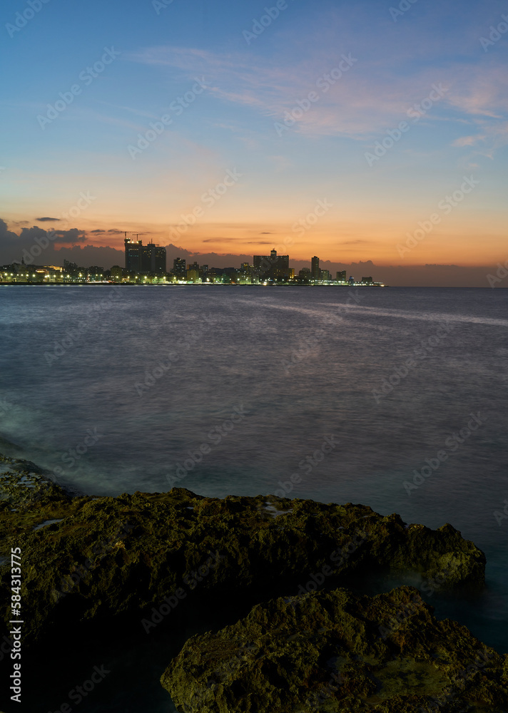 The city skyline from the Malecon in Havana at sunset