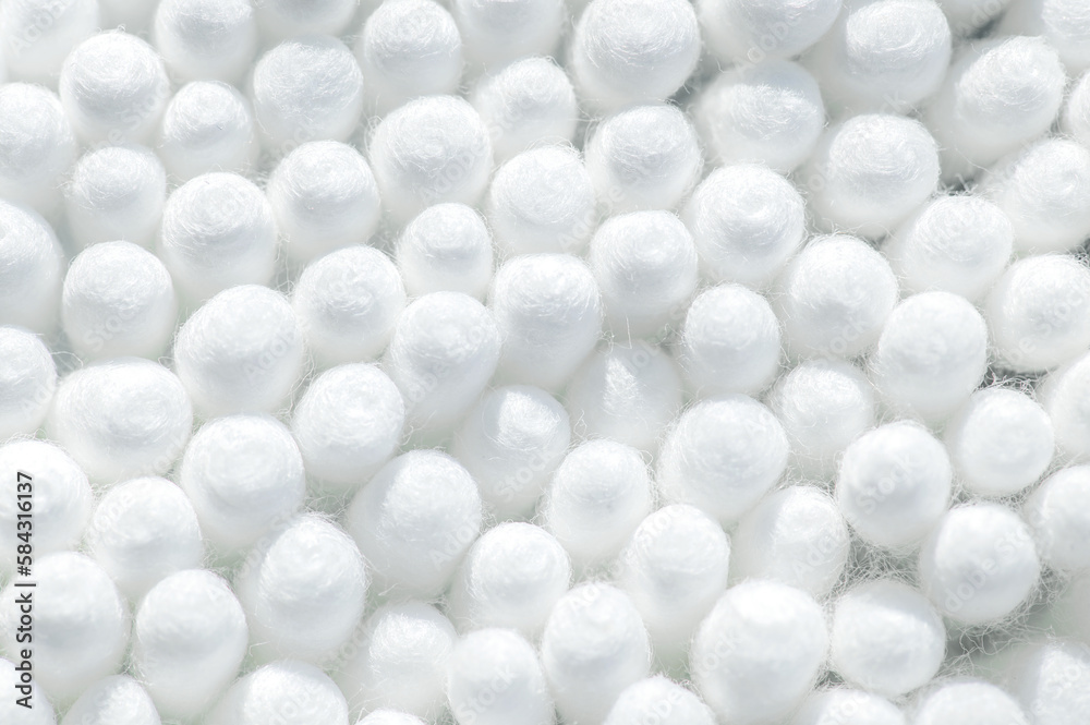 Abstract background of cotton buds in white color