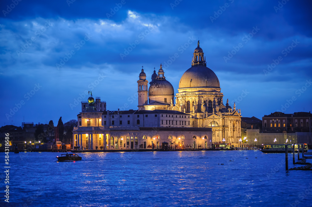 Santa Maria della Salute church in Venice, Italy, in blue light