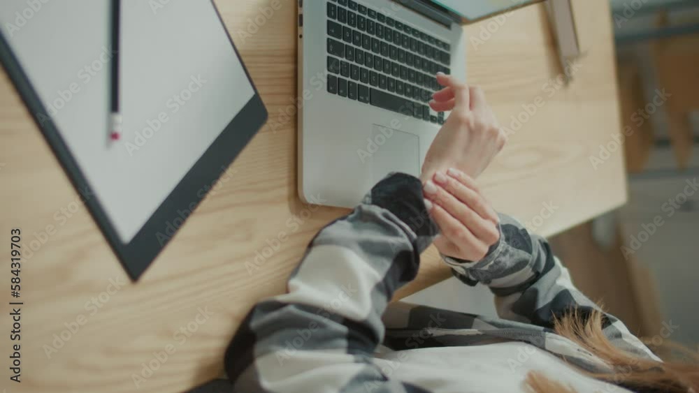 Closeup. Wrist Pain. A Woman Suddenly Feels Pain in her Wrist During