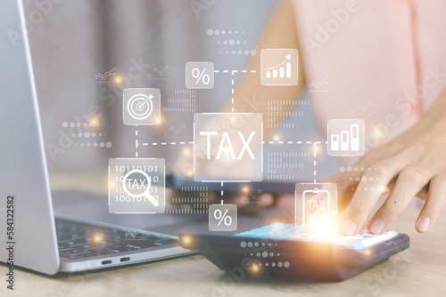 e-tax Invoice concept woman's hand is building a including debit note, credit note and receipt to be in electronic form with digital signature or time stamp