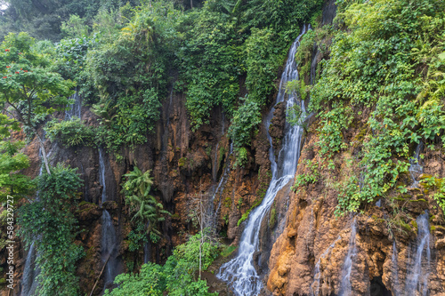 Goa Tetes waterfalls in East java area © Didik