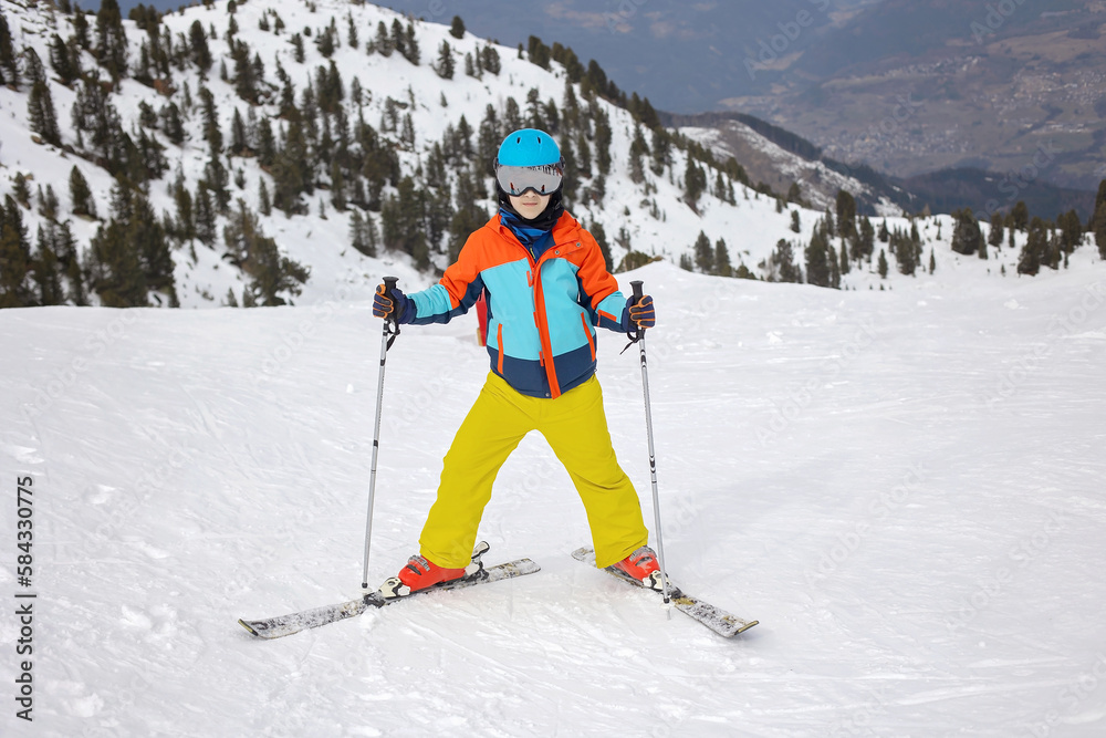 Happy family, enjoying ski holiday with children, sunny beautiful weather Happy family, enjoying ski holiday with children, sunny beautiful weather