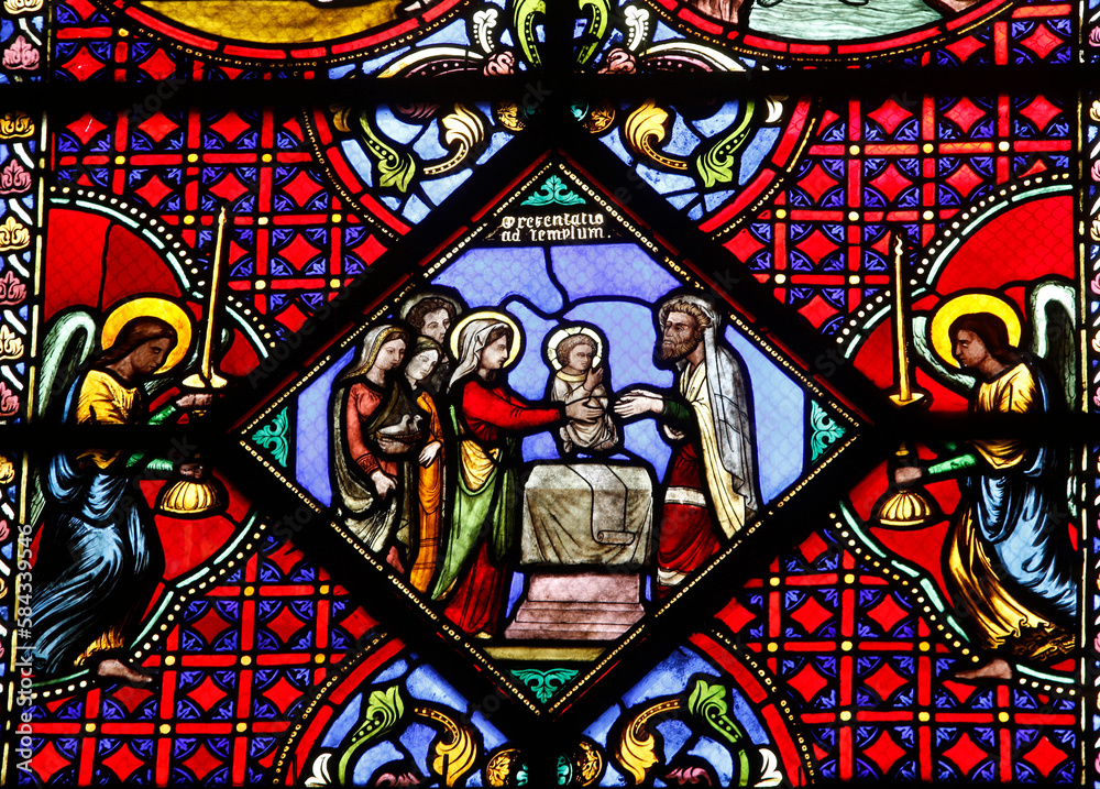 Notre-Dame du Port basilica, Clermont-Ferrand, Auvergne. France. Stained glass. Presentation of Jesus at the synagogue.