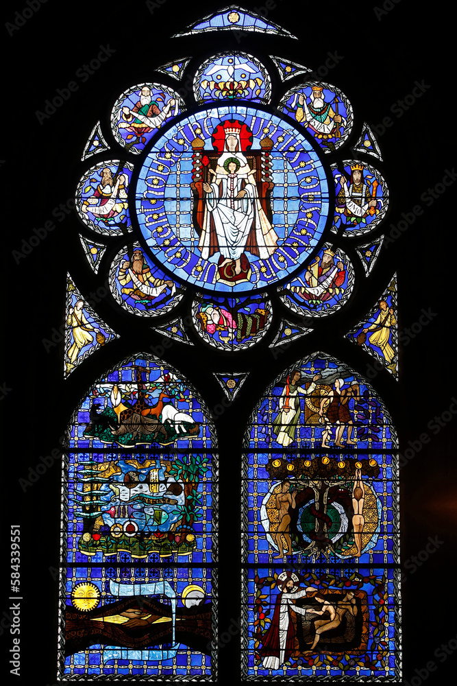 Notre Dame de Clermont cathedral, Clermont-Ferrand, France. Stained glass. Genesis.