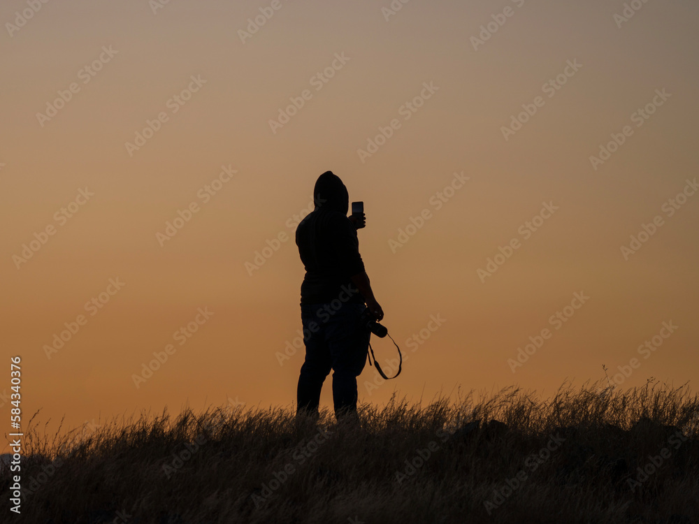 photographer in golden hour photographer in golden hour