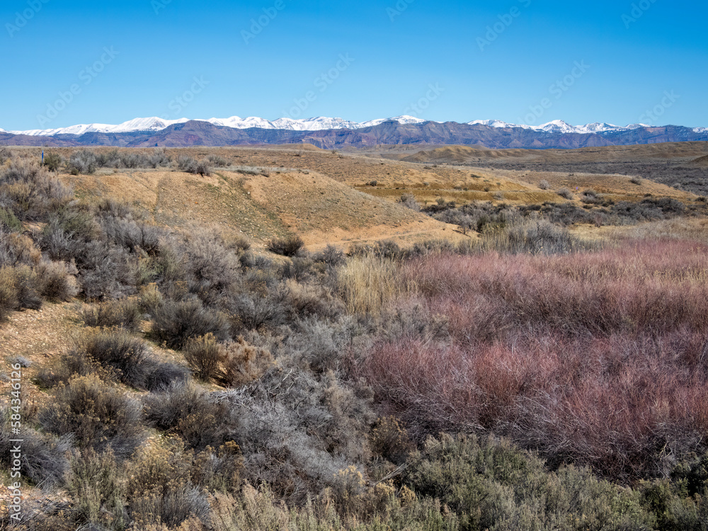 View of the snowy Bookcliffs in western Colorado after a spring storm