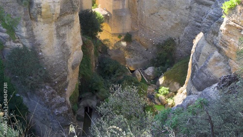 Ronda, a beautiful view of Ronda’s El Tajo Canyon at sunset on a summer day. Ronda, a famous UNESCO heritage city in Malaga Province, Andalusia, Spain
