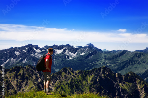 Hiker in the mountains, Allgäu Alps, Oberstdorf, Bavaria, Germany.