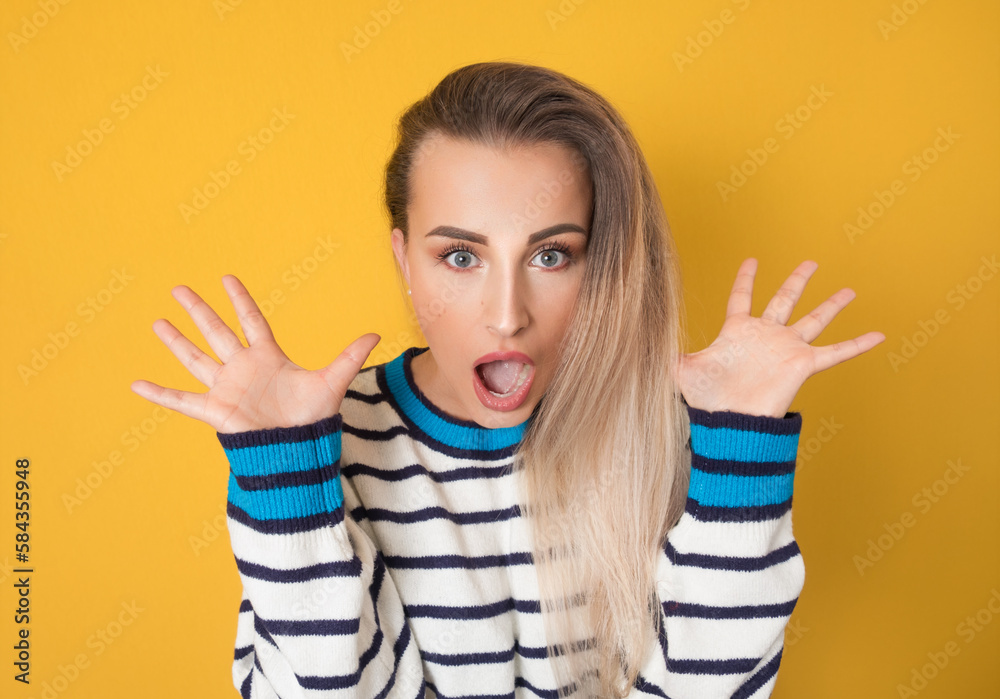 Close up surprised woman looking to you, isolated on yellow background. Freak out girl Close up surprised woman looking to you, isolated on yellow background. Freak out girl