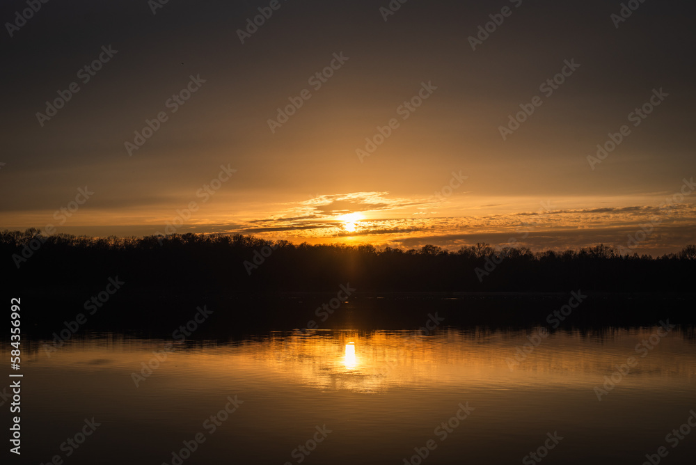 An orange sunset on the lake An orange sunset on the lake