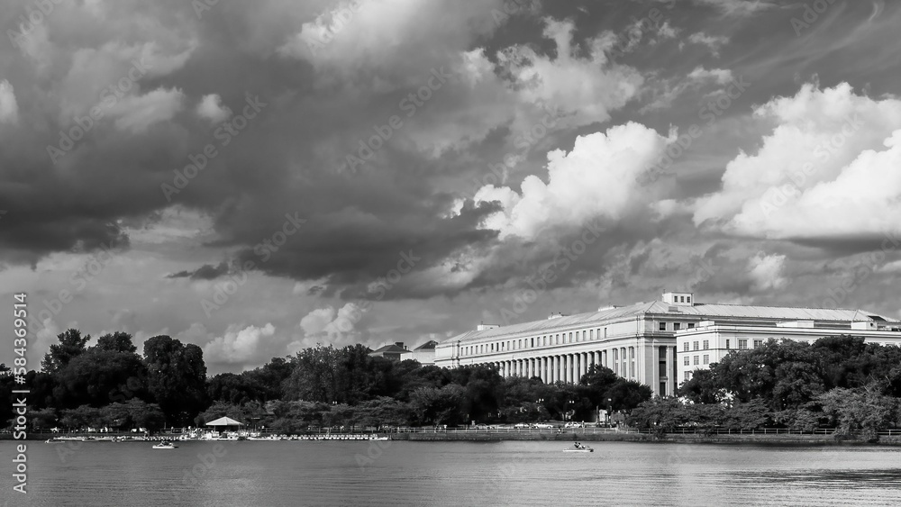 Beautiful grayscale view of a government building across the water in Washington DC