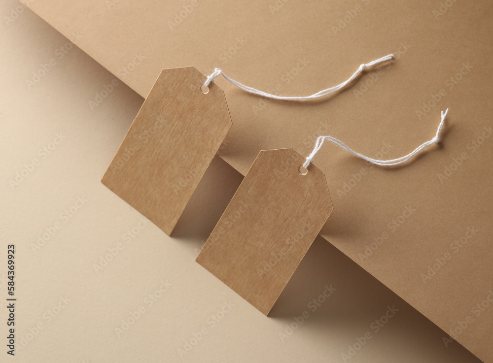 empty-craft-paper-price-tags-on-brown-background-creative-layout