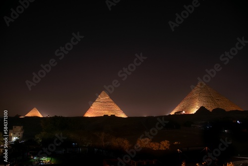 View of the illuminated Pyramids of Giza in Egypt