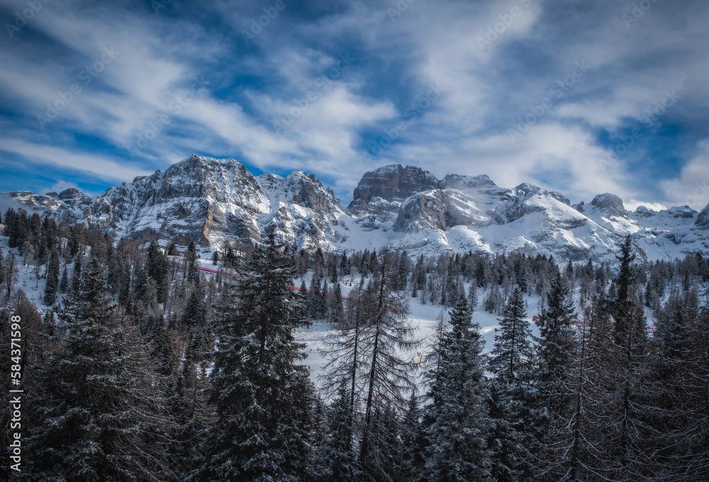A beautiful view of Brenta Dolomites with fantastic clouds and Alps Madonna di Campiglio, Pinzolo, Italy. January 2023