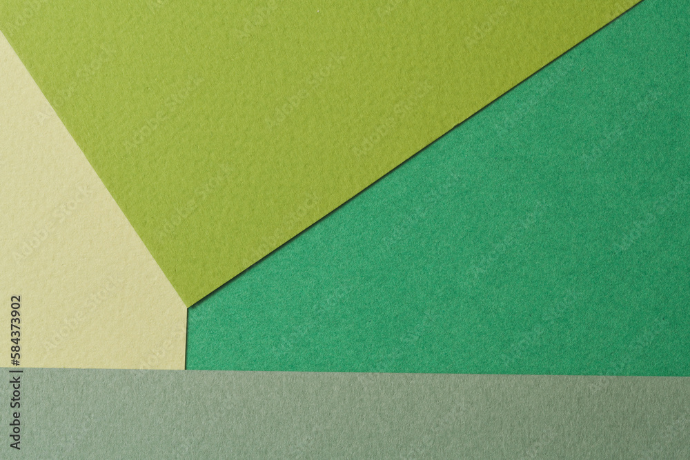 Rough kraft paper background, paper texture different shades of green. Mockup with copy space for text Rough kraft paper background, paper texture different shades of green. Mockup with copy space for text