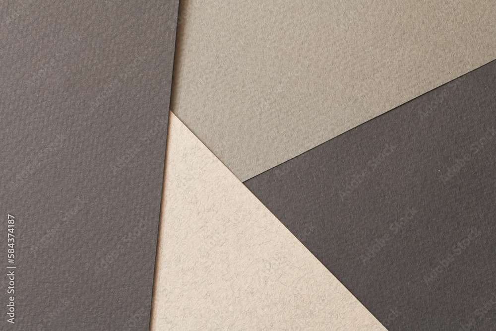 Rough kraft paper background, paper texture different shades of black grey. Mockup with copy space for text Rough kraft paper background, paper texture different shades of black grey. Mockup with copy space for text