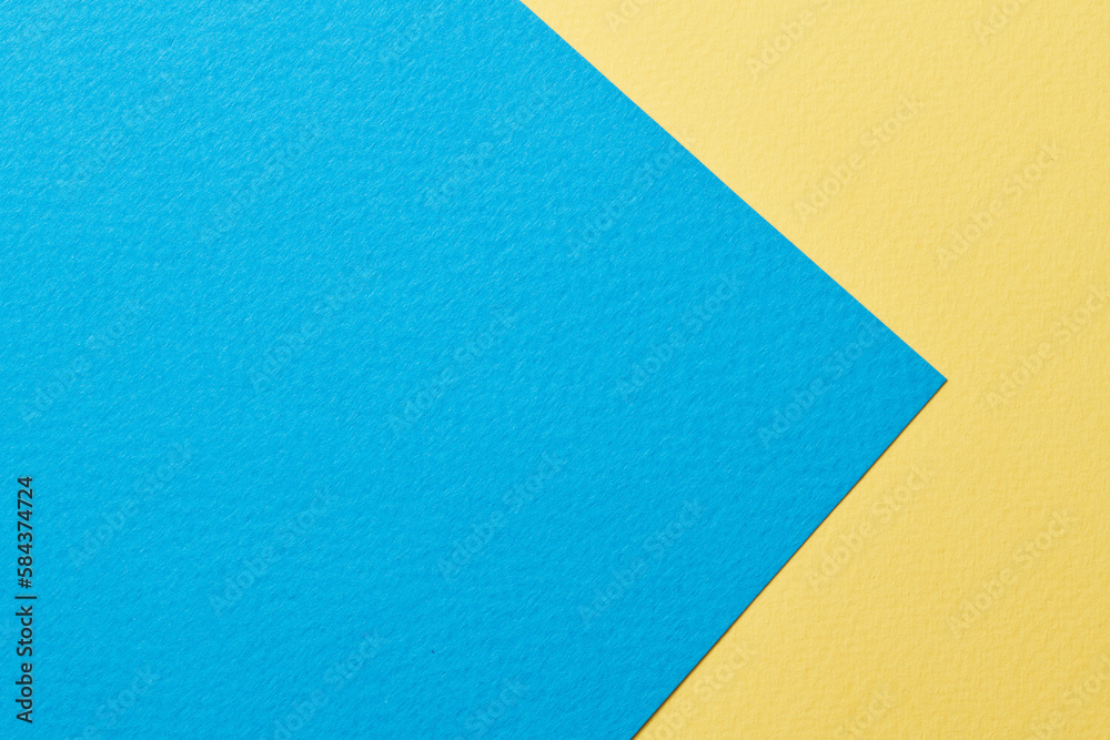 Rough kraft paper background, paper texture blue yellow colors. Mockup with copy space for text Rough kraft paper background, paper texture blue yellow colors. Mockup with copy space for text