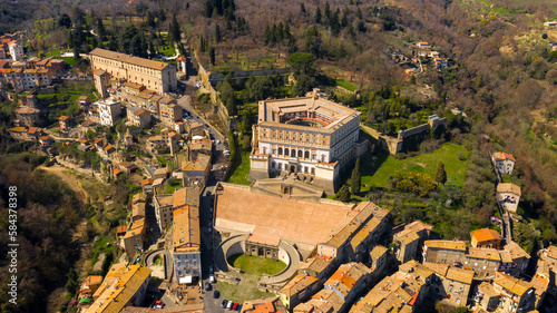 Aerial view of the Villa Farnese, a pentagonal mansion in Caprarola, near Viterbo, Italy. It is a massive Renaissance and Mannerist construction. It is built on a five-sided plan in reddish gold stone