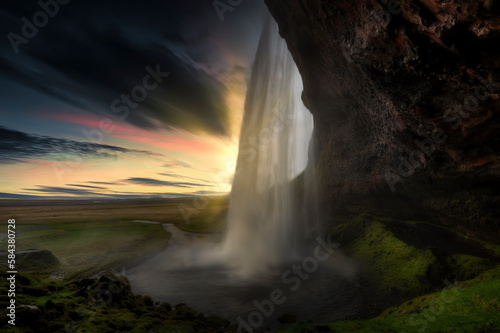 Seljalandsfoss is a waterfall in Iceland. The Seljalandsá river, the 'liquid river', drops about 60 meters