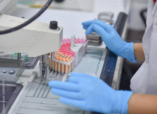 A pathologist is preparing a pathological biopsy for laboratory diagnosis of pathology.