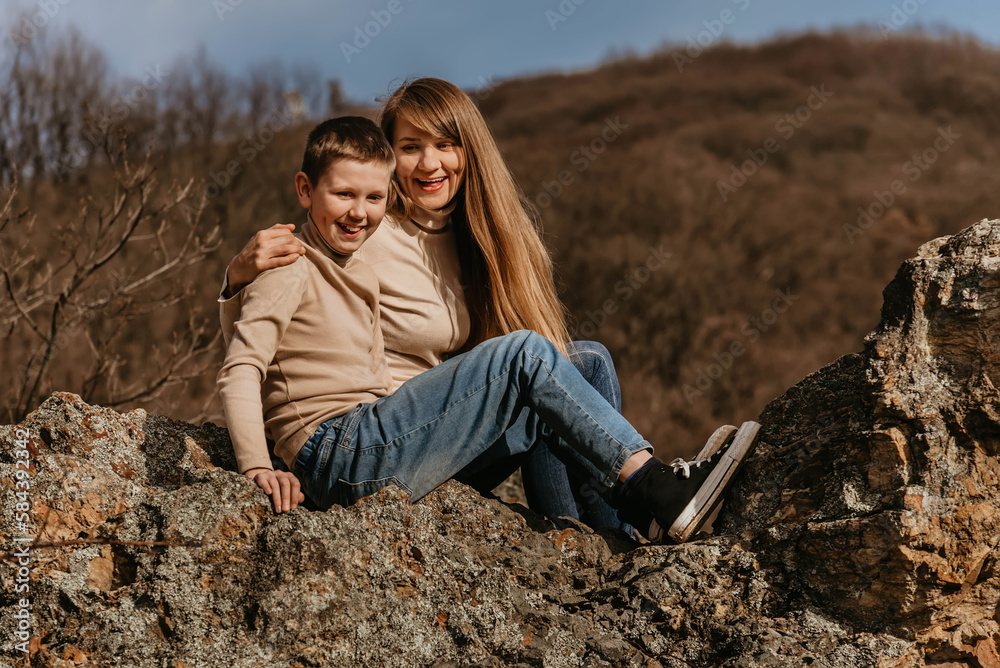 Mother and Child Having Fun on Forest Rock Mother and Child Having Fun on Forest Rock