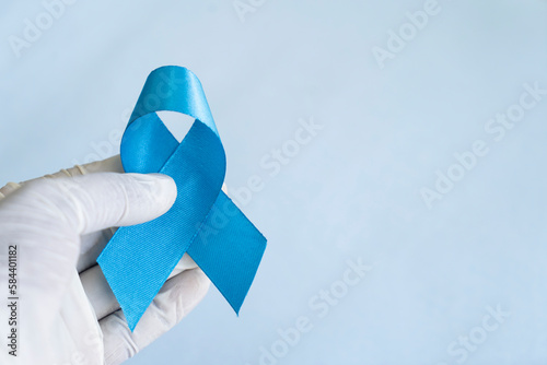 Light blue colour awareness ribbon, awareness concept image photo