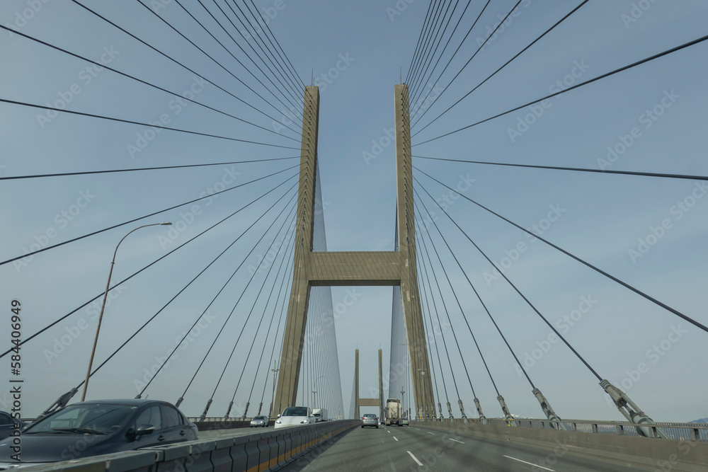 Naklejka premium The Alex Fraser Bridge is a cable-stayed bridge over the Fraser River that connects Richmond and New Westminster with North Delta in Greater Vancouver, BC.