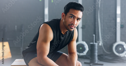 Portrait of man, fitness and healthy gym sports muscle training athlete. Young calm Asian male, wellness exercise workout motivation and bodybuilder vision relax in lifestyle health club studio