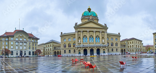 Ensemble of government buildings on Bundesplatz square, with Bundeshaus in the middle in Bern, Switzerland photo