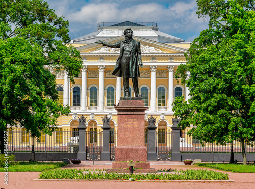Monument to Russian poet Alexander Pushkin on Culture square and Russian museum at background, Saint Petersburg, Russia