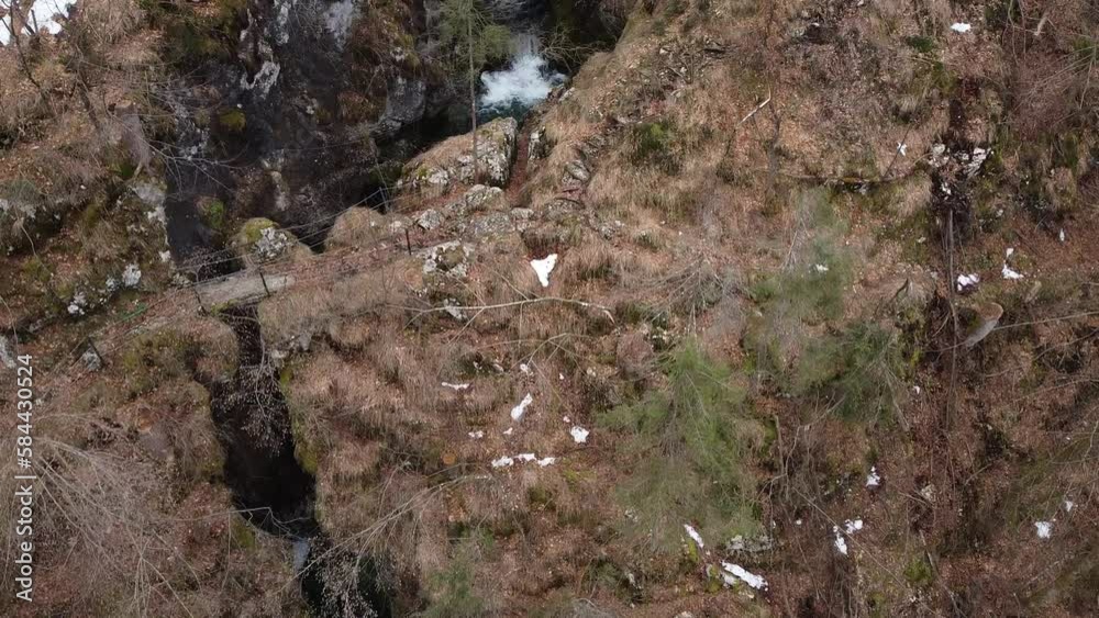 Creek on a hill ends up with waterfall Creek on a hill ends up with waterfall