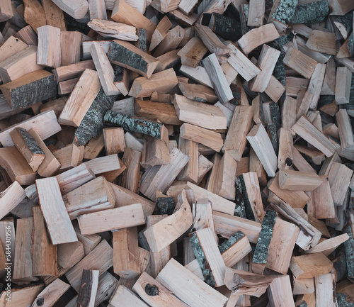 stacked logs of firewood texture background