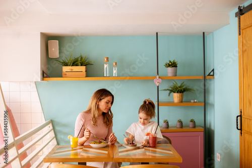 Mother and daughter having ...