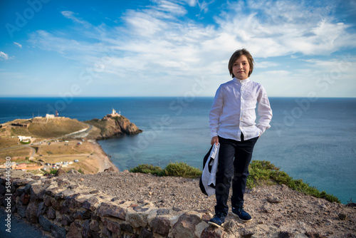 A Dreamy Moment: Photographs of the Boy Posing on the Cliff