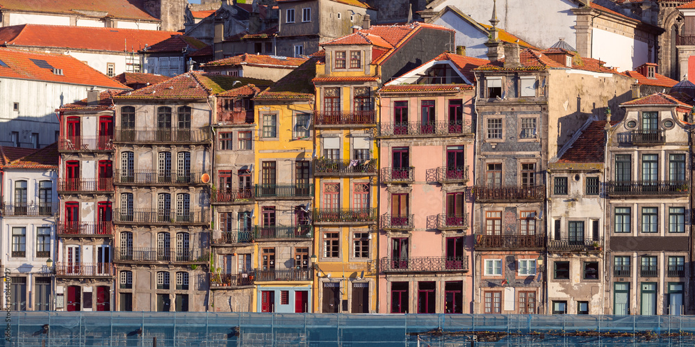 Colorful facades of houses in the old district of Porto.