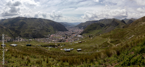 HUANCAVELICA, PERU - MARCH 23, 2023: Panoramic view of the city of Huancavelica from the foot of Cerro Tesorero. Photograph taken behind the most distant houses.