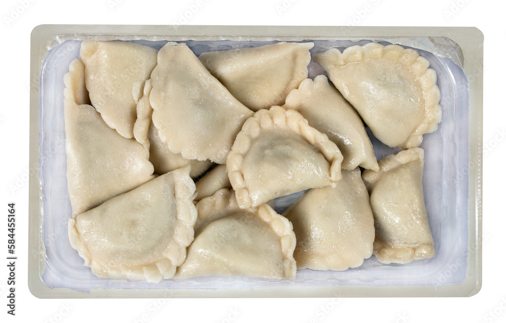 Dumplings in foil packaging ready to be reheated in the kitchen. Food from the market. Isolated background. Dumplings in foil packaging ready to be reheated in the kitchen. Food from the market. Isolated background.
