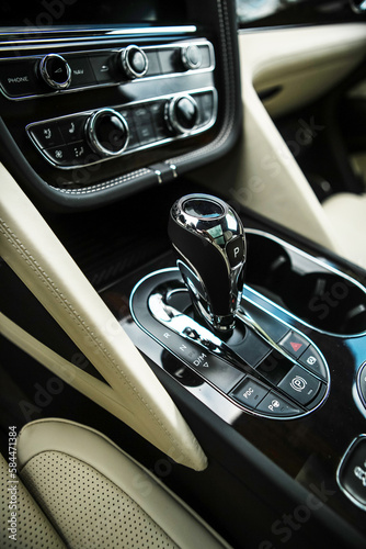 gear lever made of expensive leather in a premium car © AvokadoStudio