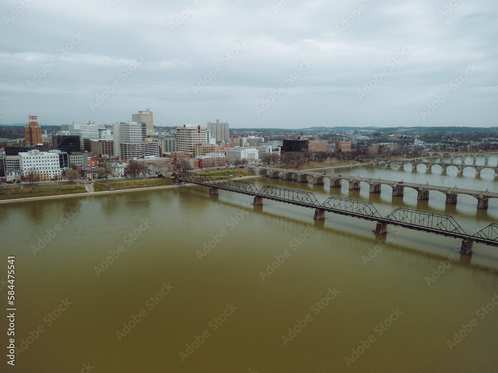 Aerial drone view of cityscape and bridges. 